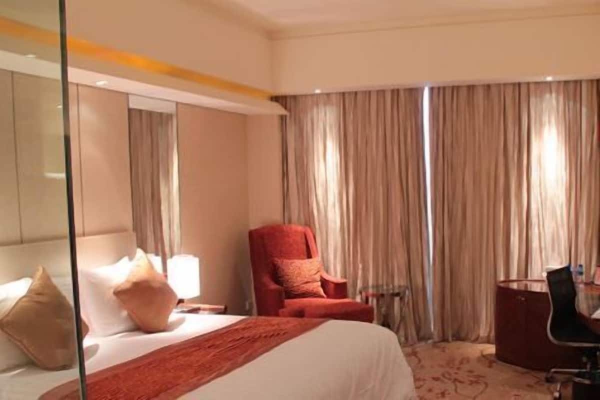 Camera Deluxe | Biancheria da letto di alta qualità, copriletto in piuma, minibar