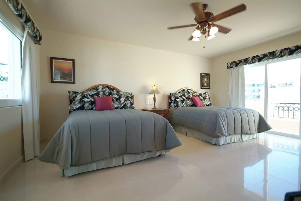 Deluxe Suite, 3 Bedrooms | Premium bedding, down comforters, desk, iron/ironing board