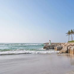 On the beach, sun-loungers, beach umbrellas, beach towels