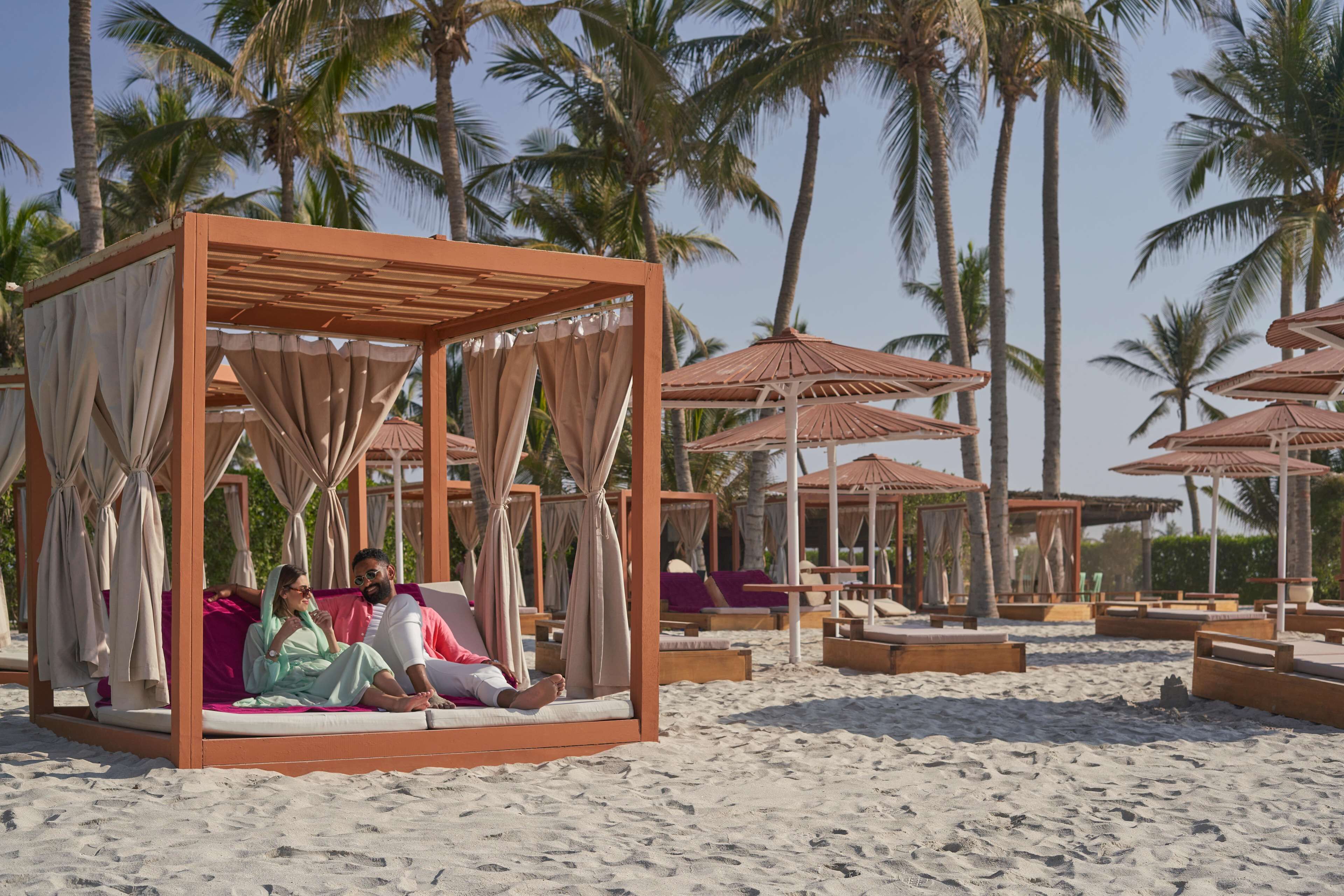 On the beach, sun loungers, beach umbrellas, beach towels