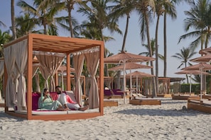 On the beach, sun-loungers, beach umbrellas, beach towels - Juweira Boutique Hotel - Adults only (Salalah)