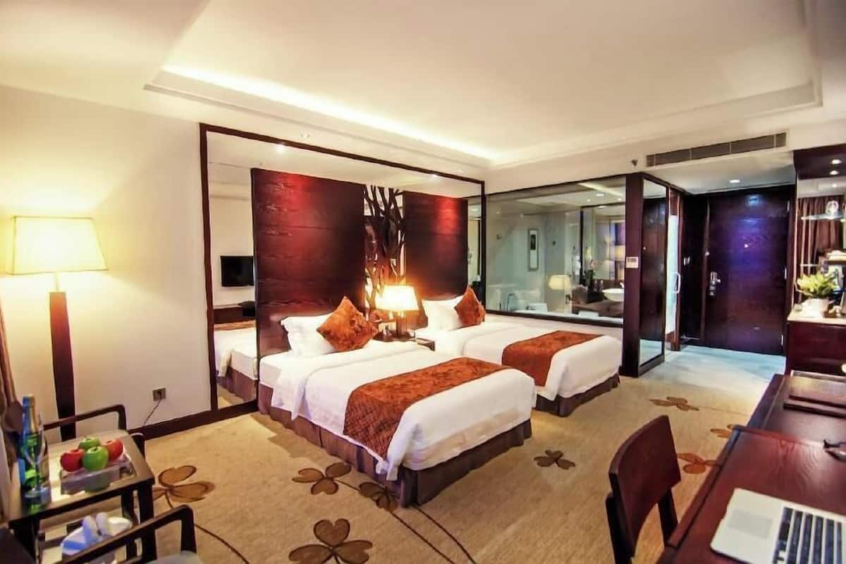 Ropa de cama de alta calidad y minibar