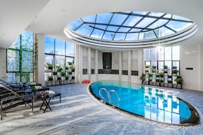 Indoor pool, sun loungers