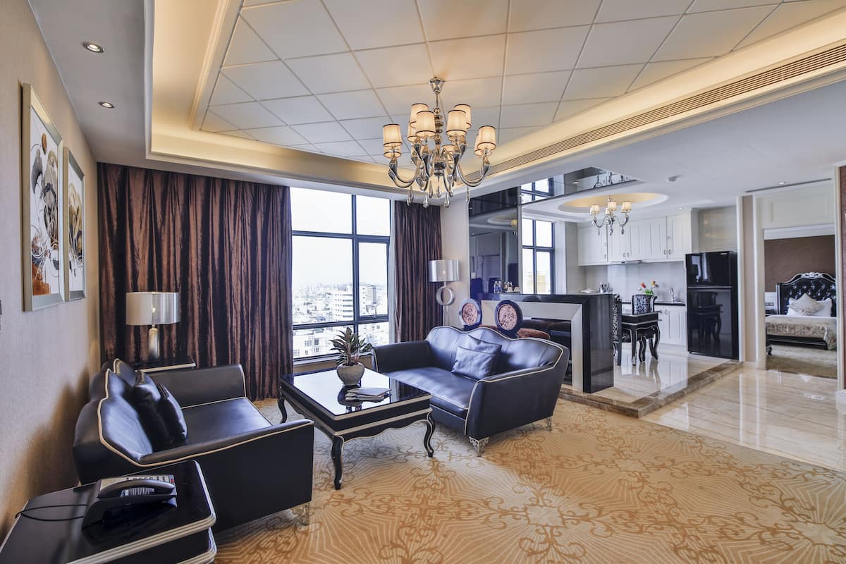 2 Bedroom Suite Apartment | Living room | Flat-screen TV, iPod dock
