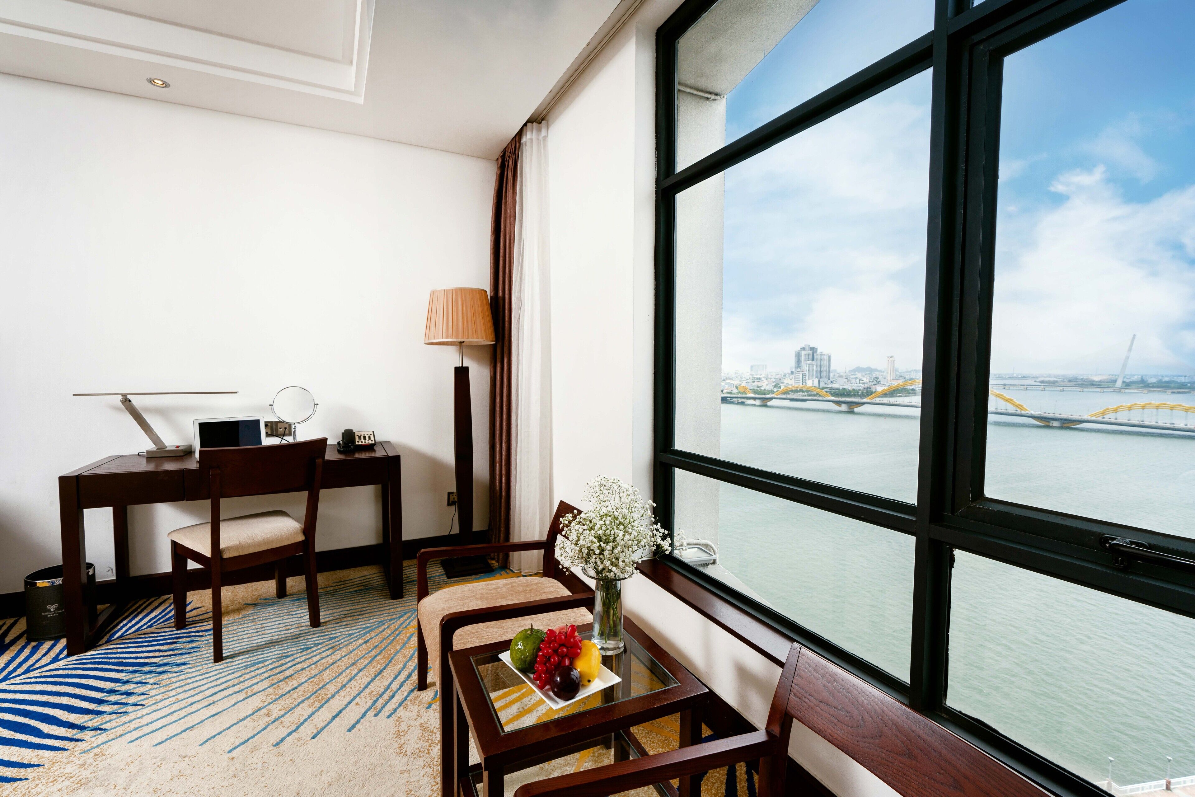 deluxe twin river view | premium bedding, minibar, in-room safe, desk