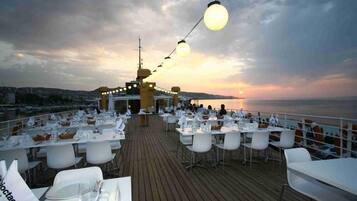 Breakfast, lunch, dinner served; beach views