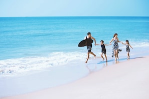 Sun loungers, beach umbrellas, beach towels