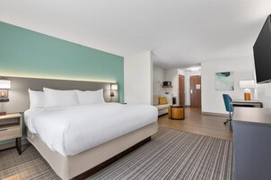 Suíte, 1 cama King, para não fumantes | Roupas de cama premium, cofres nos quartos, escrivaninha
