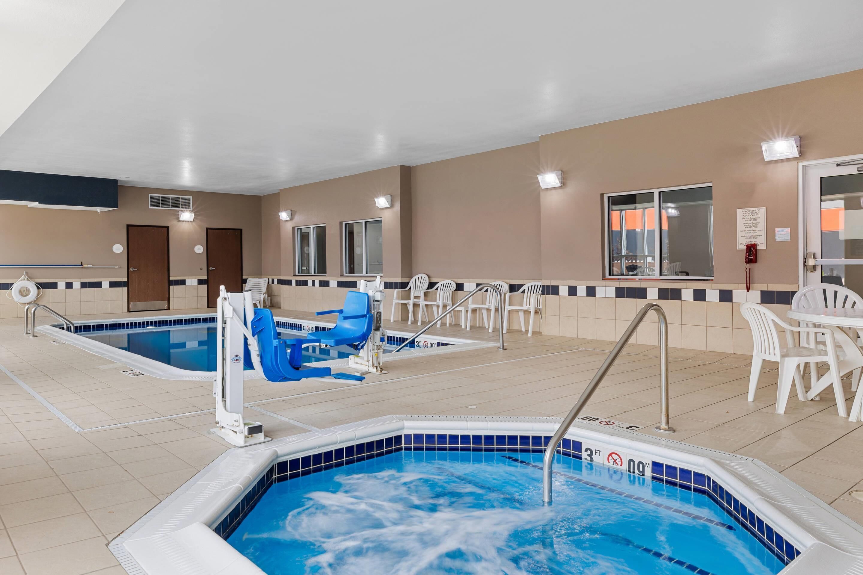 Indoor pool, open 8 AM to 10 PM, pool loungers