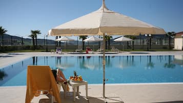 Indoor pool, seasonal outdoor pool, pool umbrellas, sun loungers