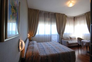 Frette Italian sheets, Select Comfort beds, minibar, in-room safe