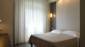 Classic Double Room | Minibar, in-room safe, desk, soundproofing