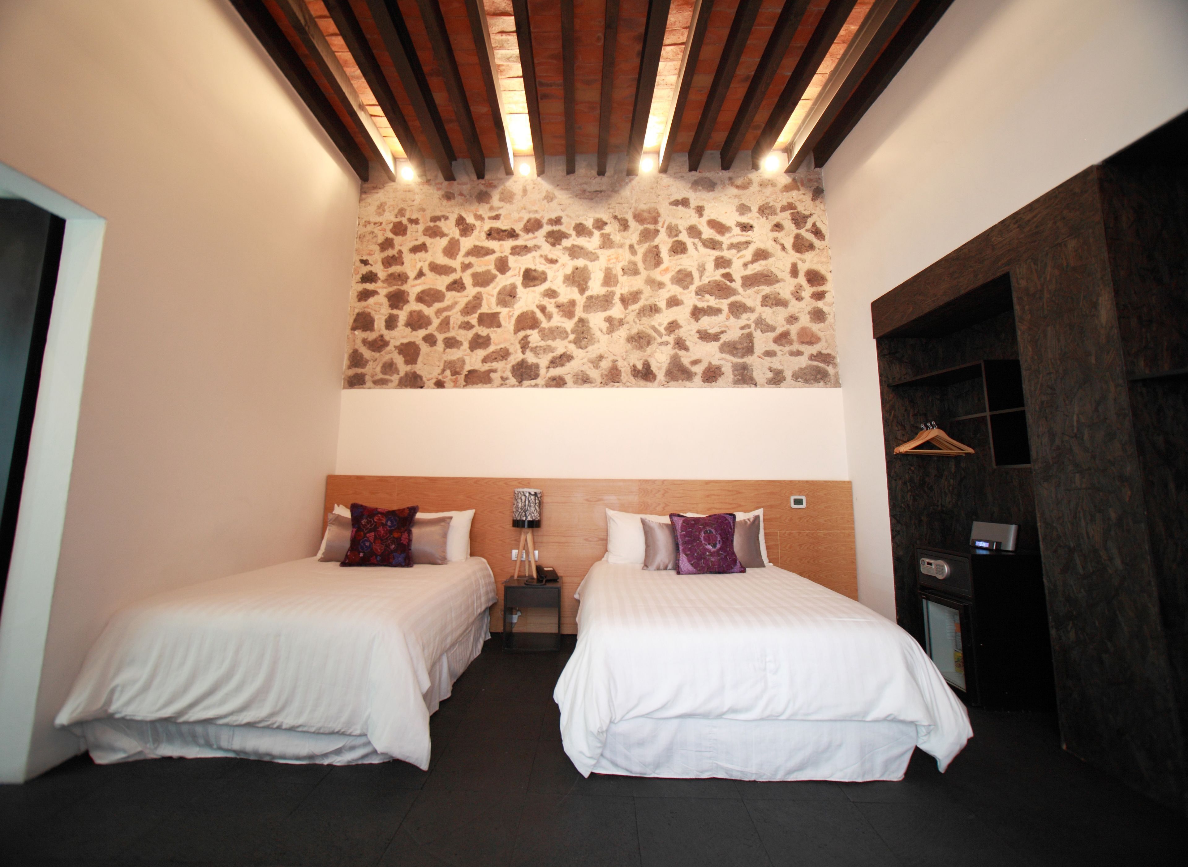 Premium bedding, down comforters, minibar, in-room safe