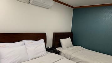 Habitación Deluxe con 2 camas individuales | Escritorio, cortinas opacas, sistema de insonorización