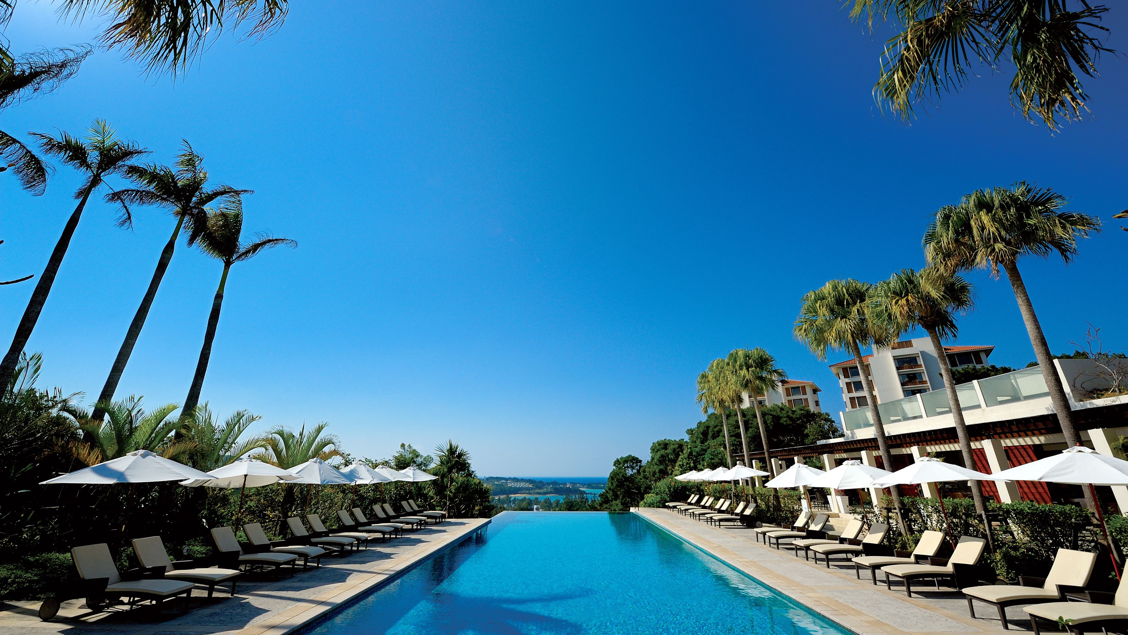 Outdoor pool, pool umbrellas, sun loungers