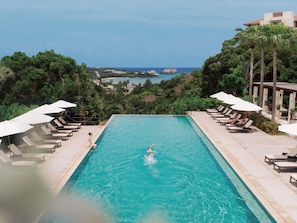 Outdoor pool, pool umbrellas, pool loungers