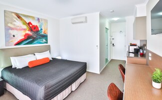 Ropa de cama de alta calidad y minibar