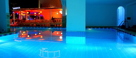 2 outdoor pools, open 7:00 AM to 7:00 PM, pool umbrellas, pool loungers