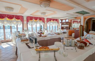 Daily buffet breakfast (EUR 8 per person)