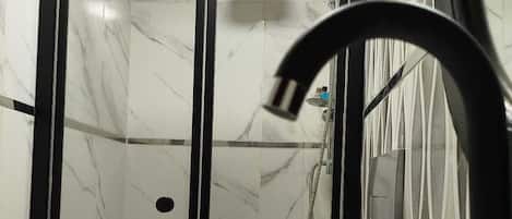 Shower, hair dryer, towels, soap
