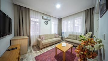 Apartamento familiar | Zona de estar | Una televisión LCD