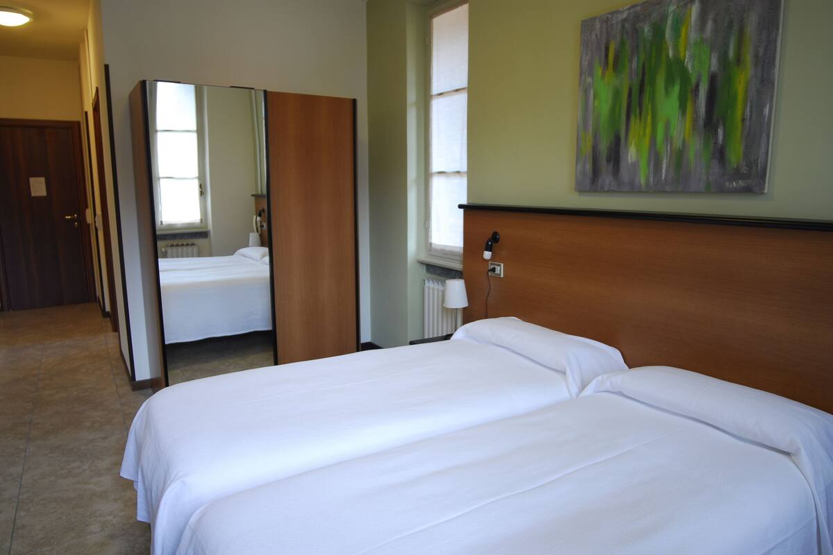 standard double room, garden view | down duvets, in-room safe, individually decorated