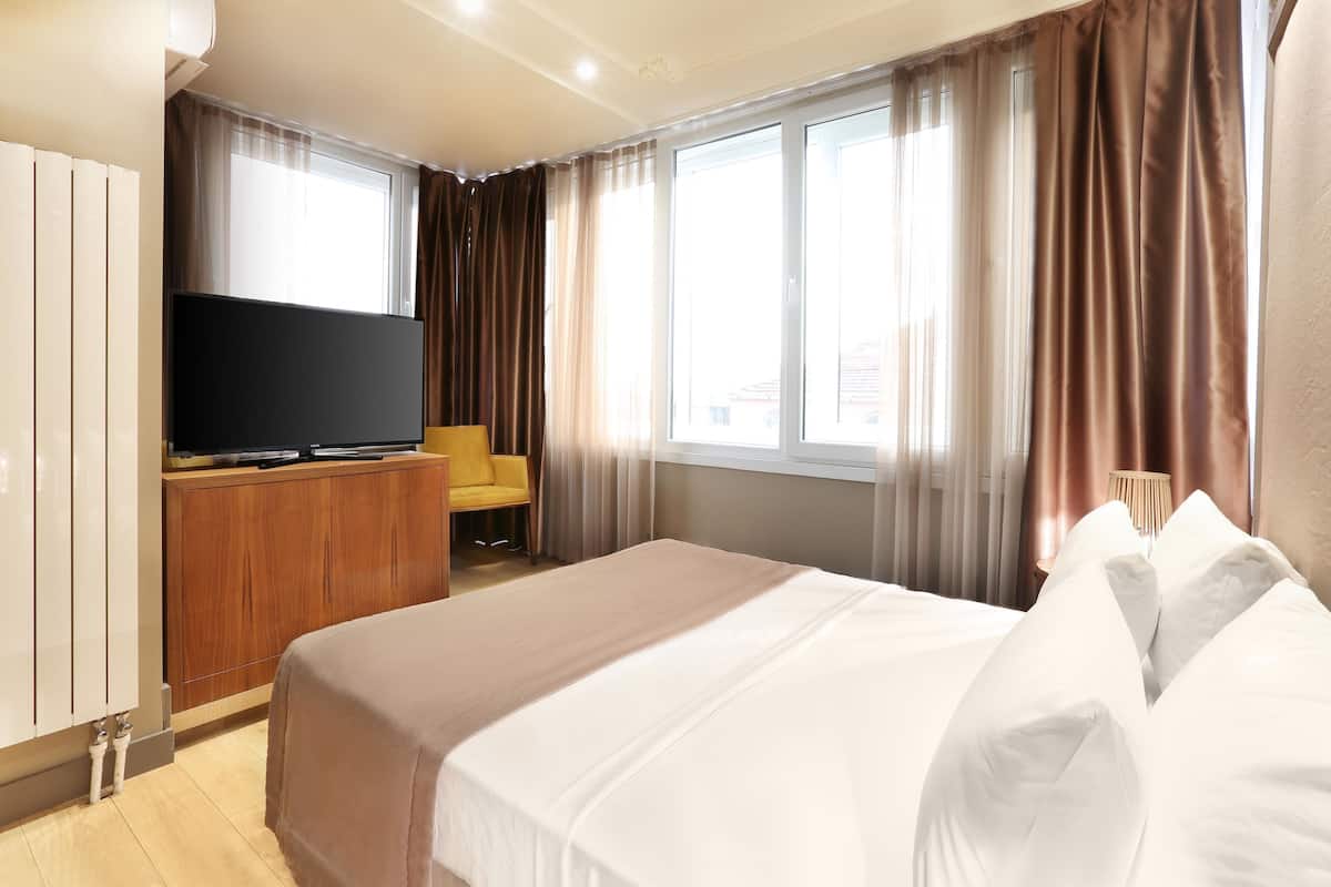 Penthouse | Een minibar, een kluis op de kamer, geluiddichte muren