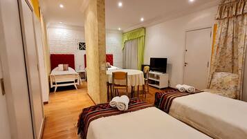 Deluxe Apartment, Multiple Beds | In-room safe, free WiFi, bed sheets