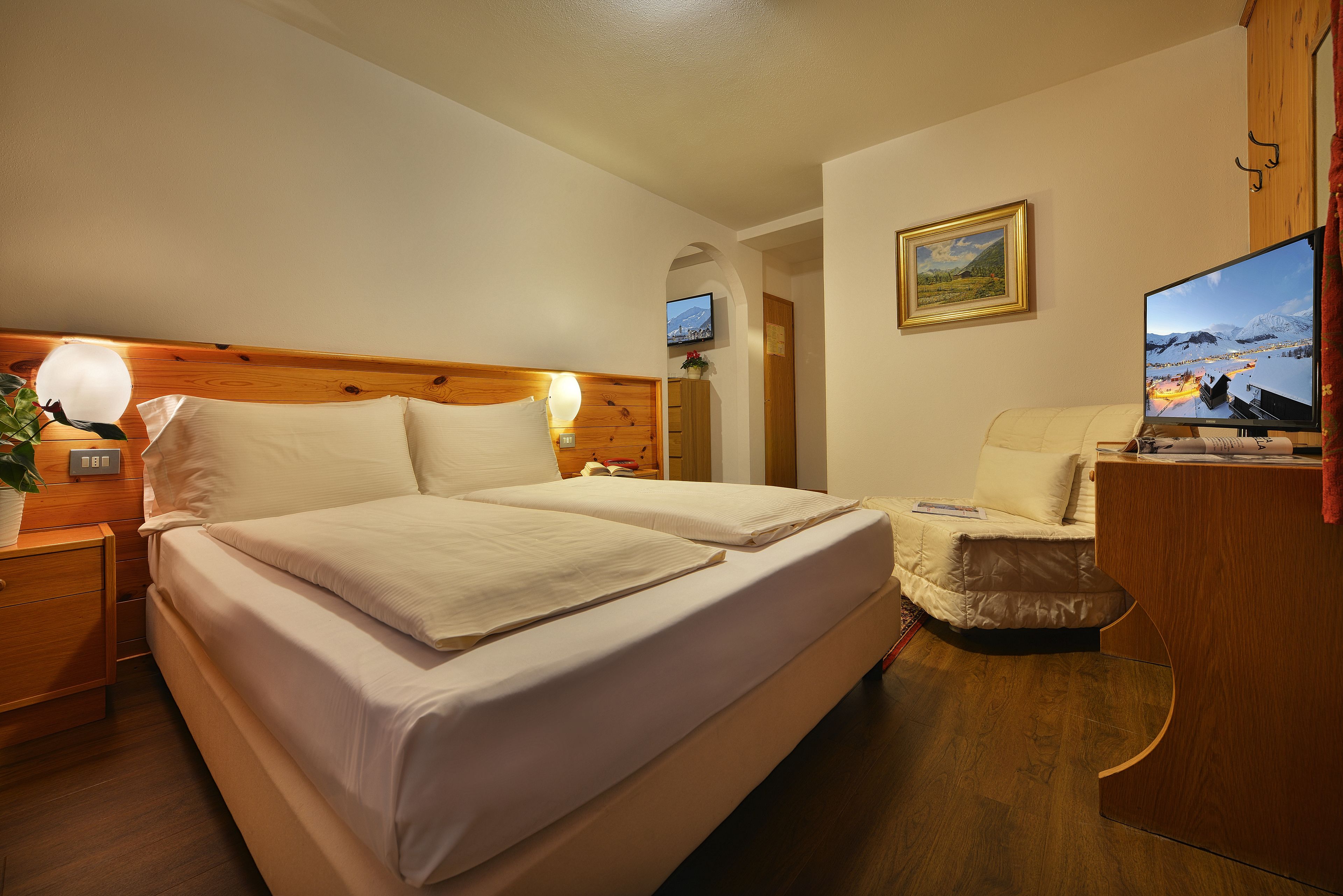 family room | frette italian sheets, premium bedding, select comfort beds