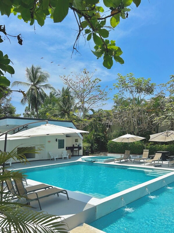 Outdoor pool, pool umbrellas, pool loungers