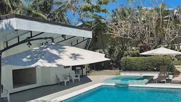 Outdoor pool, pool umbrellas, sun loungers