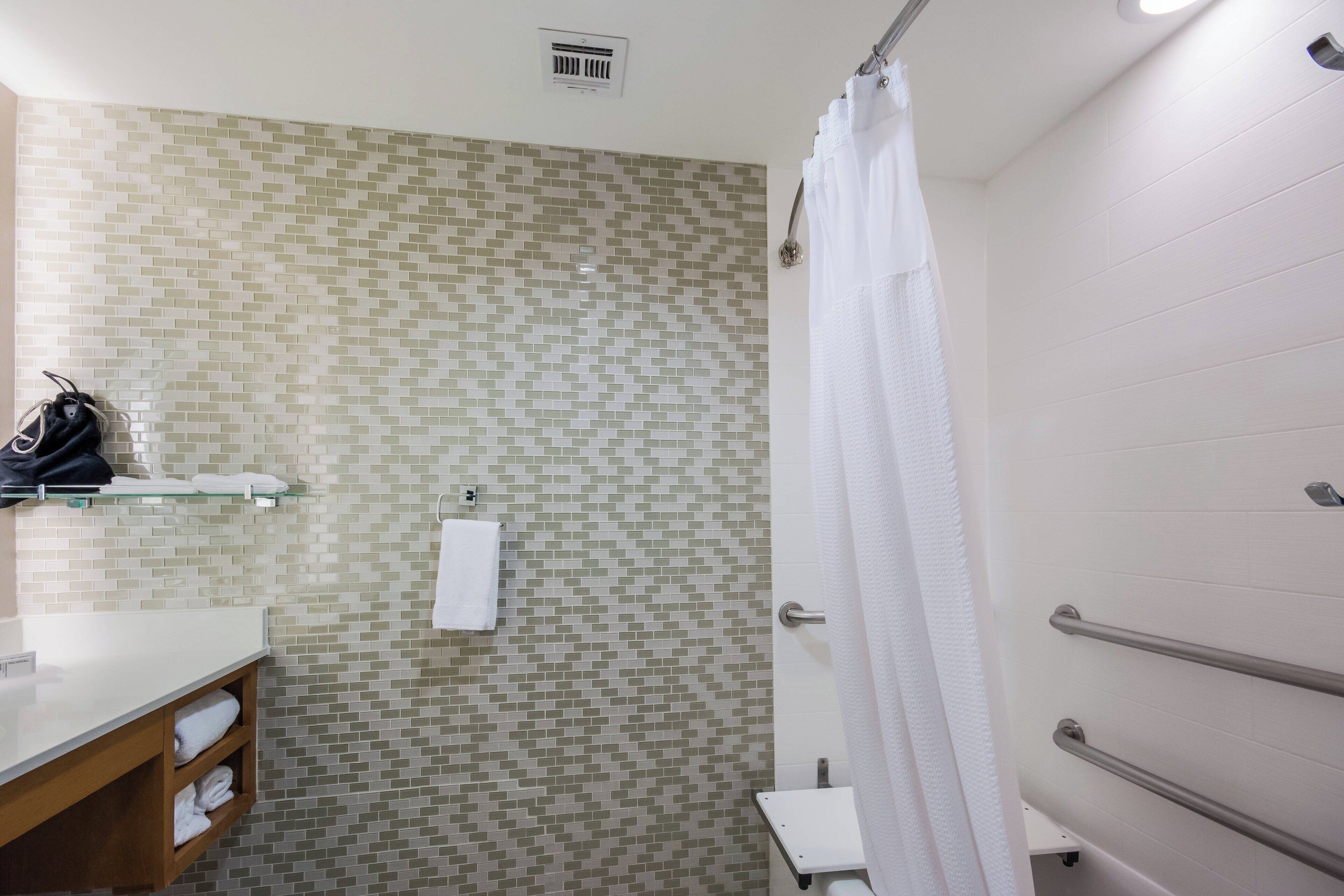 suite, multiple beds, non smoking | bathroom | shower, free toiletries, towels