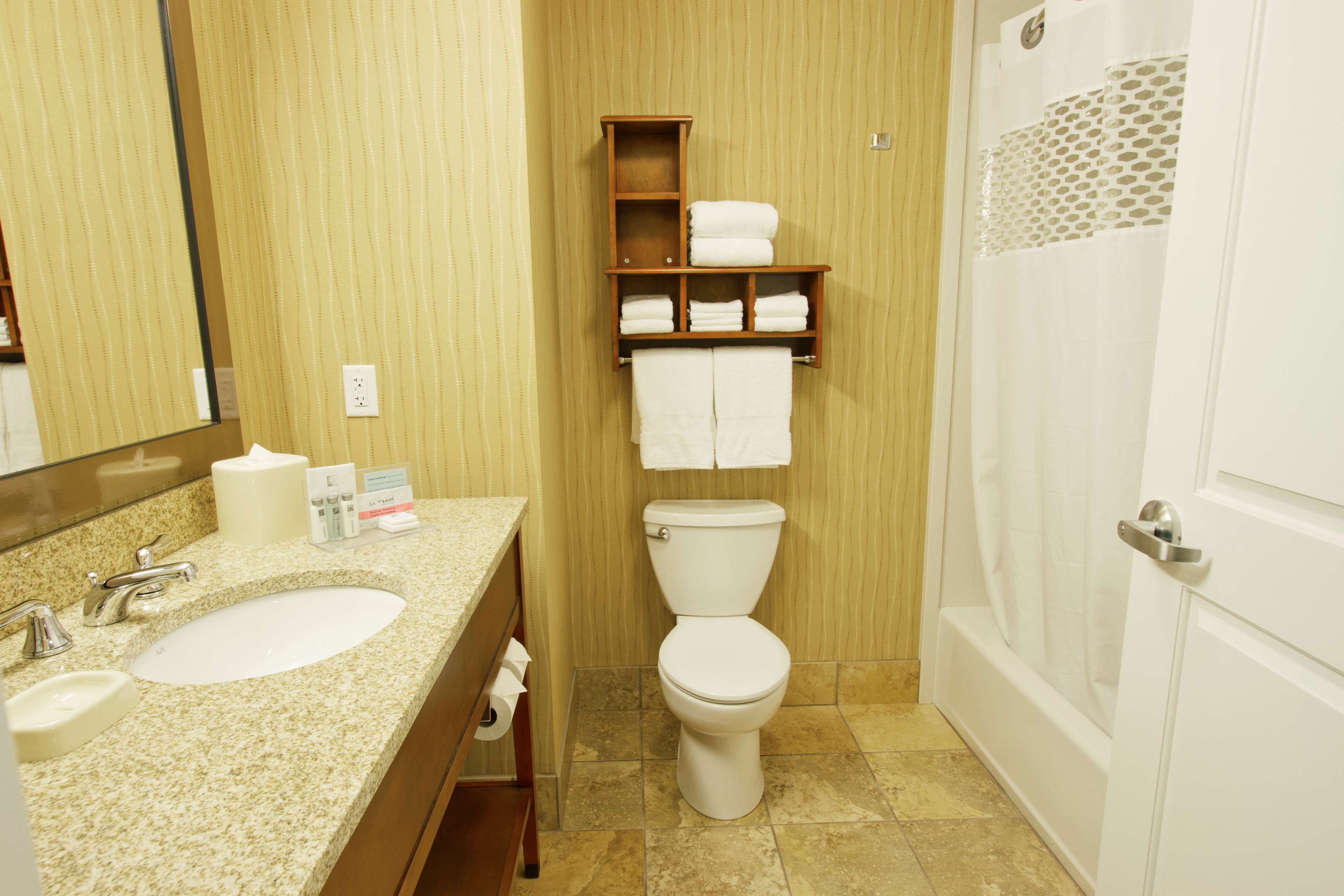 two queen beds | bathroom | free toiletries, hair dryer, towels