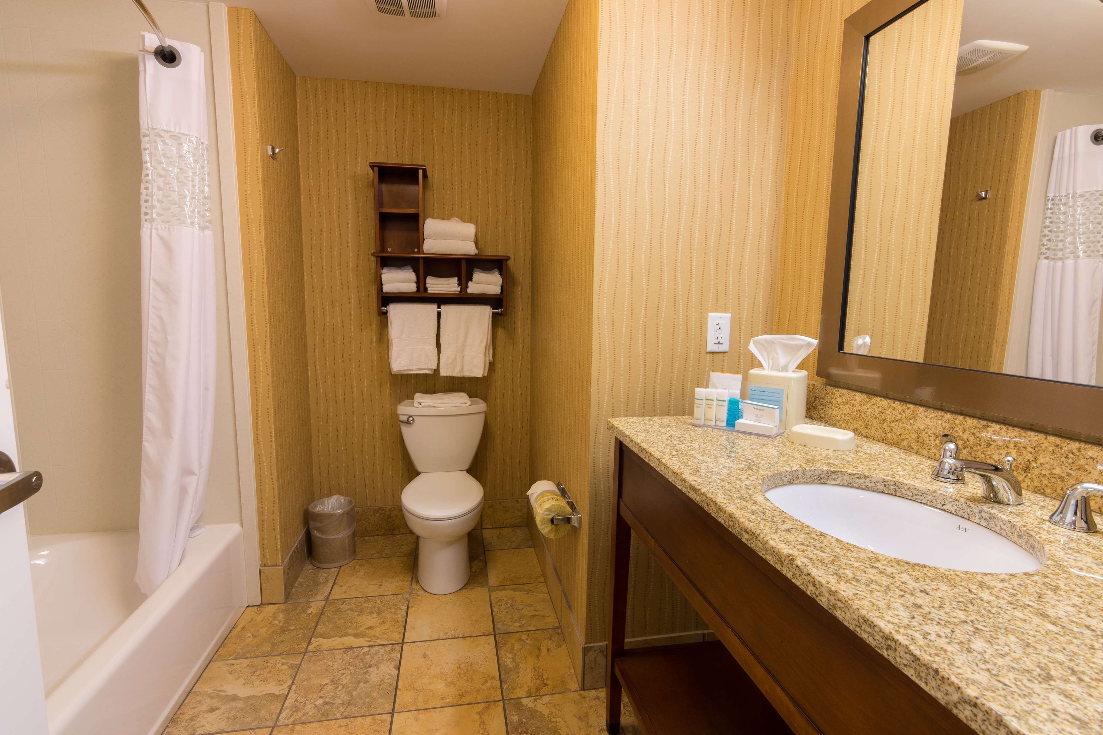 two queen beds | bathroom | free toiletries, hair dryer, towels