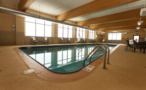 Indoor pool, open 6:00 AM to 10:00 PM, pool loungers