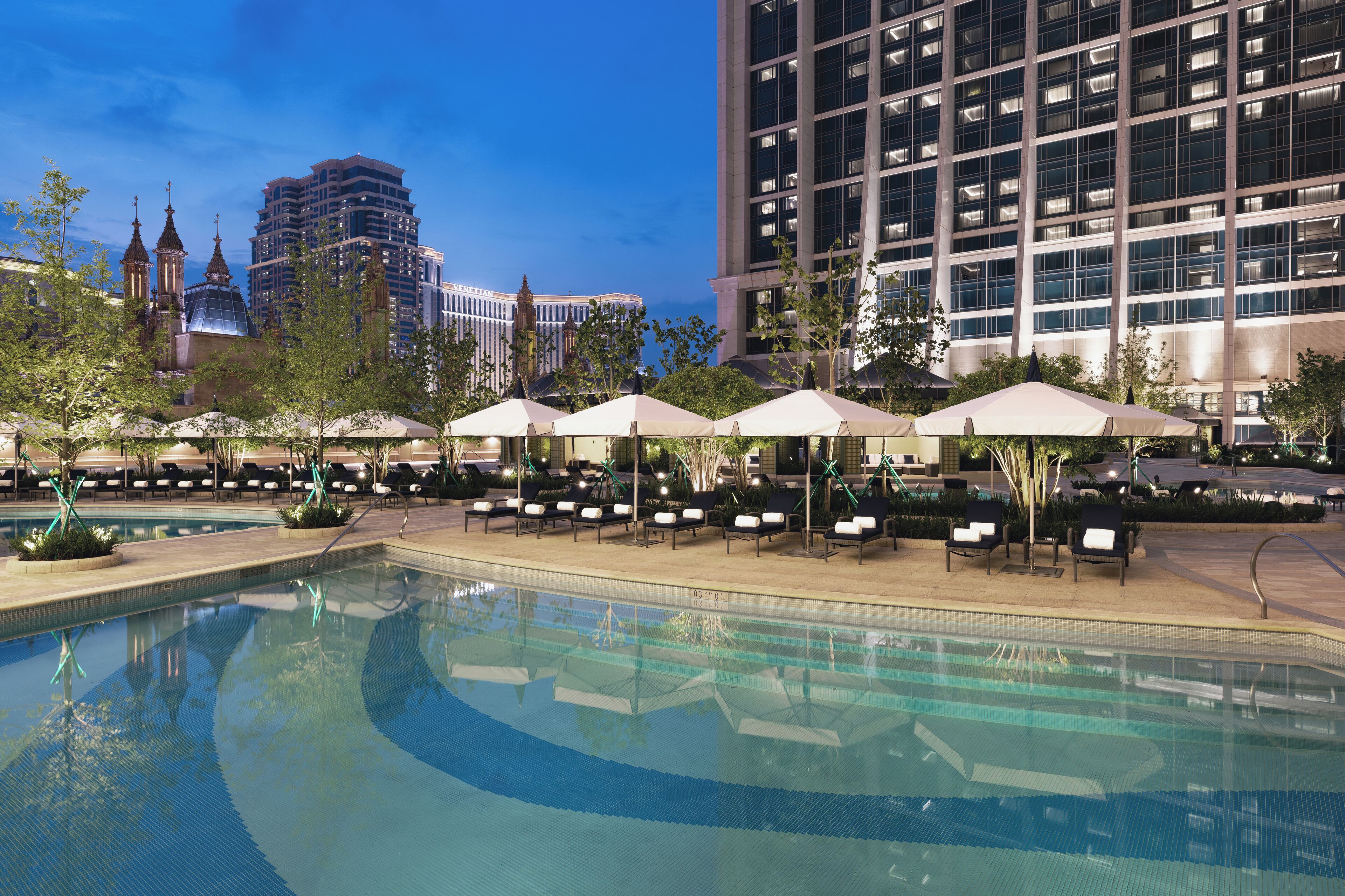 outdoor pool, pool umbrellas, pool loungers