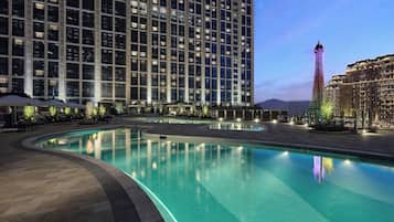 Outdoor pool, pool umbrellas, sun loungers