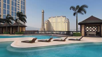 Outdoor pool, pool umbrellas, pool loungers