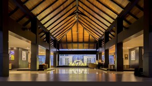 A spacious lobby with a high wooden ceiling and a central 'Hard Rock' sign. - Hard Rock Hotel Goa Calangute (Calangute)