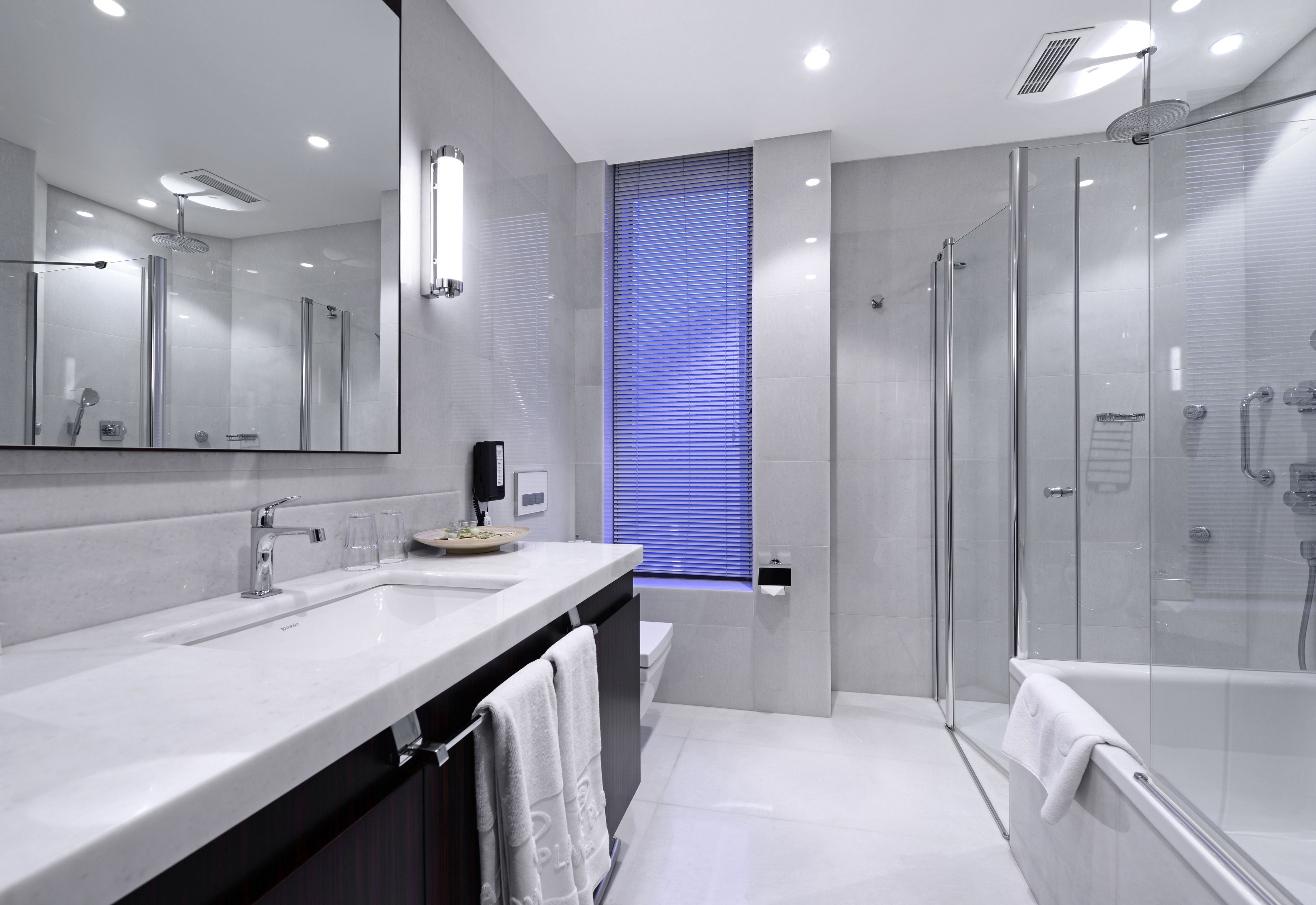 deep-soaking bathtub, free toiletries, hair dryer, bathrobes