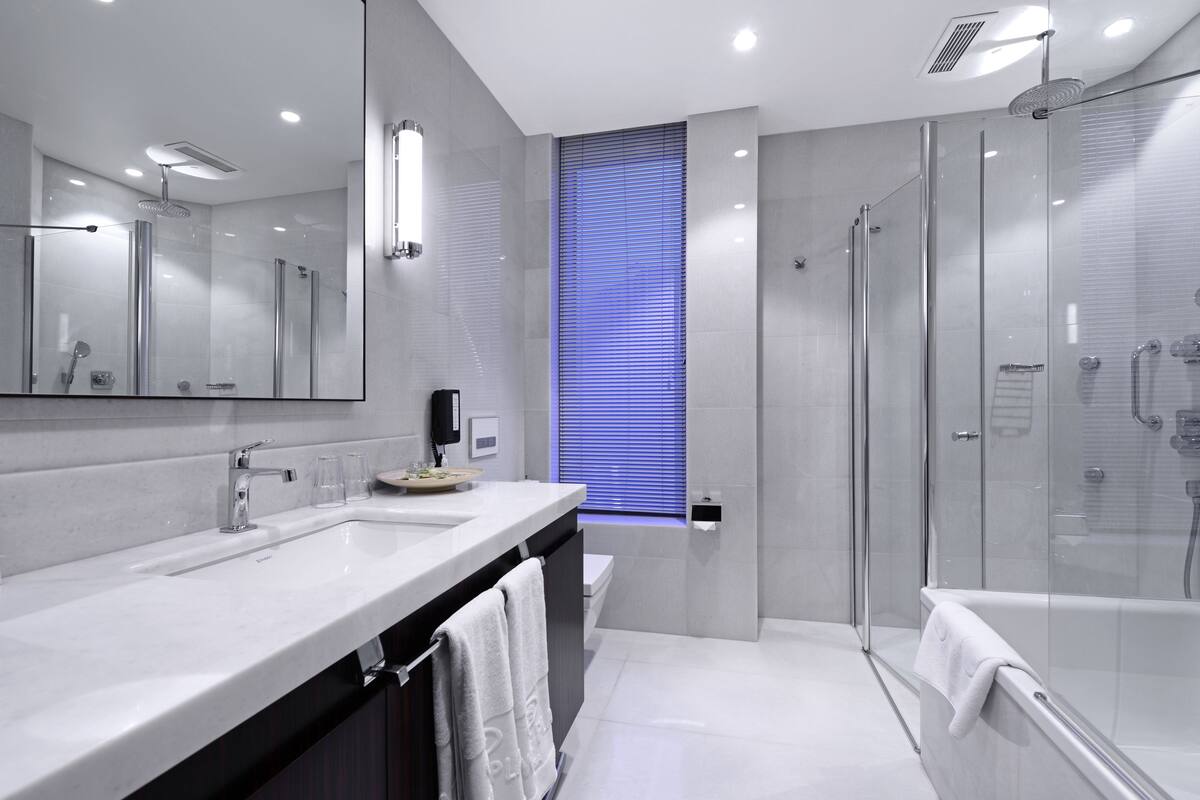 deep-soaking bathtub, free toiletries, hair dryer, bathrobes