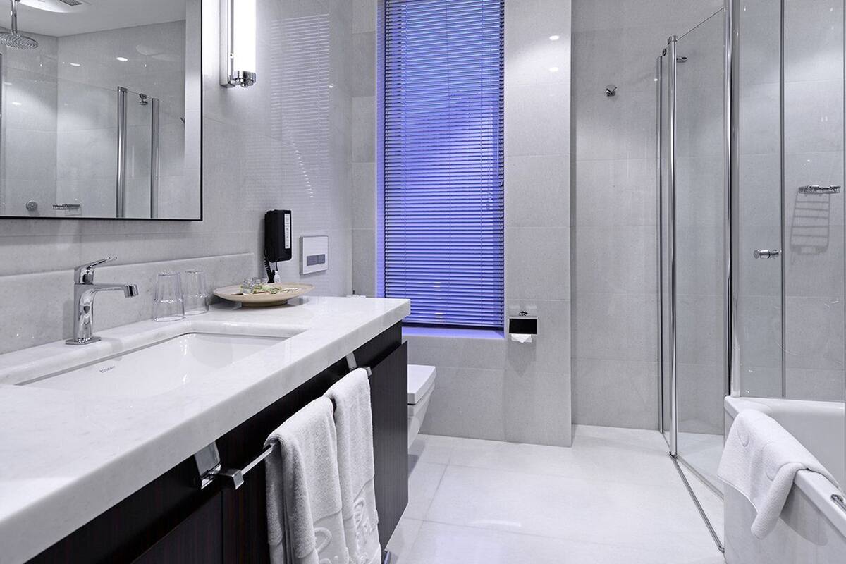 deep-soaking bathtub, free toiletries, hair dryer, bathrobes