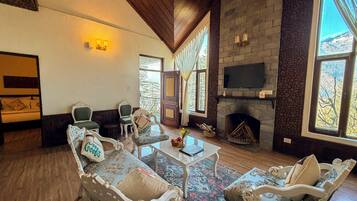 Heritage Cottage | Living area | 32-inch LED TV with satellite channels, TV, ping pong