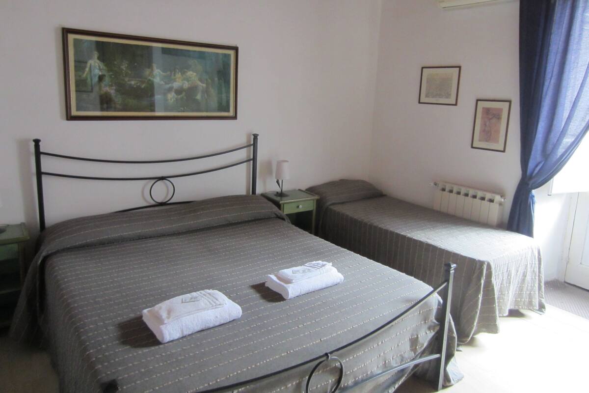 Triple Room | Desk, blackout drapes, soundproofing, cribs (free)