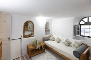 Family Villa | Living area | 30-inch Smart TV with satellite channels, TV, fireplace
