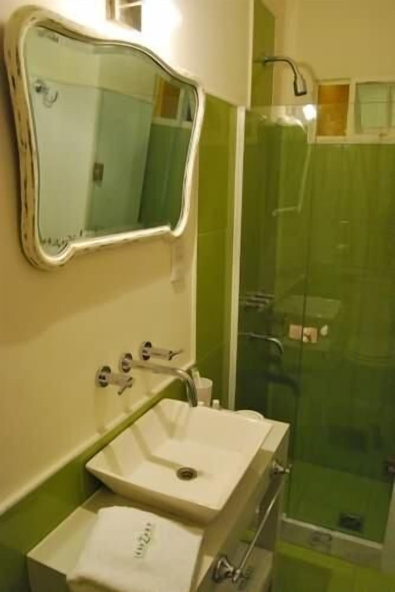 suite, balcony, city view | bathroom sink