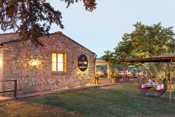 Breakfast, lunch, dinner served; Italian cuisine, garden views