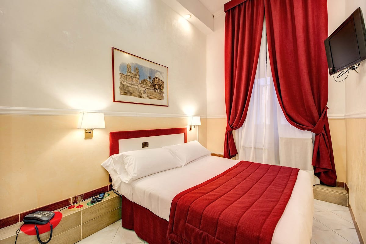 Egyptian cotton sheets, hypo-allergenic bedding, down duvets, minibar
