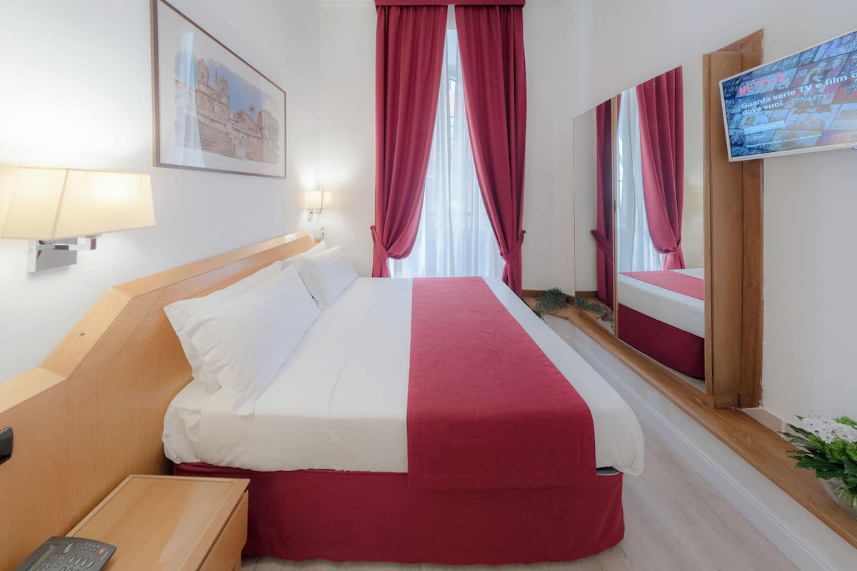 Egyptian cotton sheets, hypo-allergenic bedding, down duvets, minibar