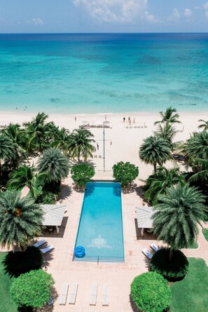 Outdoor pool, free pool cabanas, pool umbrellas